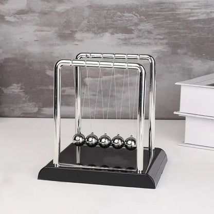 Newton Bumper Ball Physics Ornament – A Timeless Desk Accessory